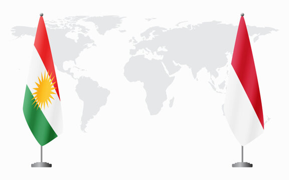 Kurdistan and Monaco flags for official meeting against background of world map.