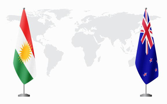 Kurdistan and New Zealand flags for official meeting against background of world map.