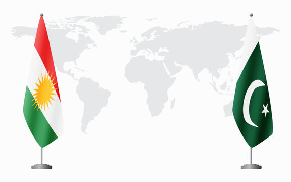 Kurdistan and Pakistan flags for official meeting against background of world map.