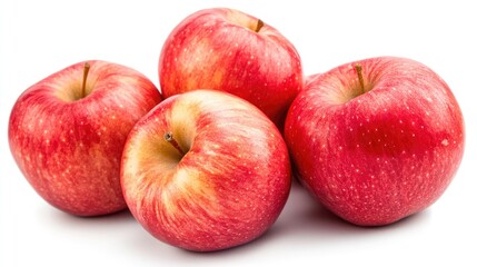 Fresh red apples stacked together on a white background showcasing their vibrant color and natural texture for culinary and health presentations.