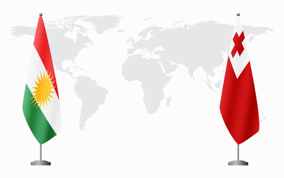 Kurdistan and Tonga flags for official meeting against background of world map.