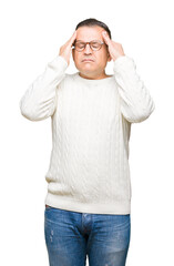 Middle age arab man wearing glasses over isolated background with hand on head for pain in head because stress. Suffering migraine.