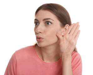 Woman showing hand to ear gesture on white background