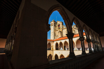 Church framed by the upper arcades of the cloister of the Cemiterio, convent of Christ, year 1162,...