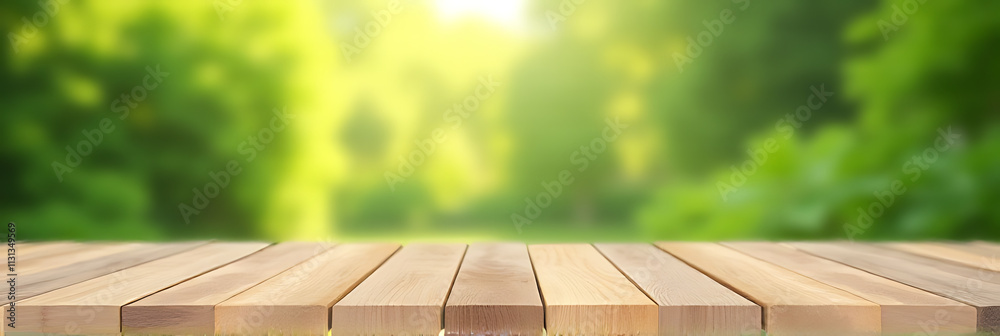 Poster a blank wooden tabletop with a blurred green garden view in the background is ideal for product disp