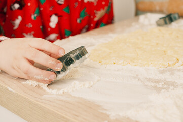 Caucasian boy crafing decorations or opening presents  at home candid shot candind shot winter holiday activities