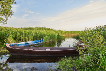 Obraz premium boat on the beautiful river