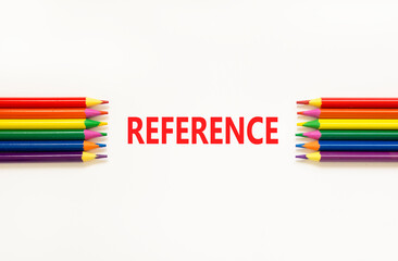 Fototapeta premium References or reference symbol. Concept word Reference on beautiful white paper. Beautiful white paper background. Beautiful colored pencils. Business references or reference concept. Copy space.