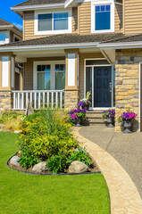 Two story luxury house with nice summer  landscape in Vancouver, Canada, North America. Day time on...
