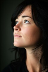 Fototapeta premium Portrait of a Woman Looking Up