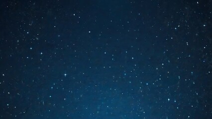 Naklejka premium falling golden flacks on blue background