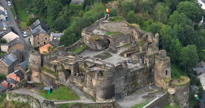 Aerial drone video of the citadel of La roche en ardenne, belgium, small village overview.