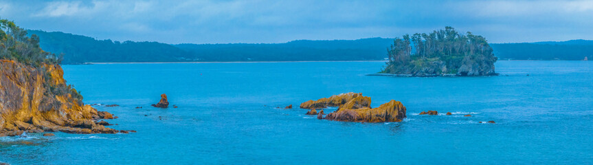 Fototapeta premium Cloudy Summer Sunrise Panorama views at Caseys Beach