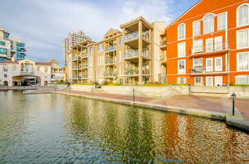 Modern apartment building with nice summer landscape in Vancouver, Canada, North America. Day time...