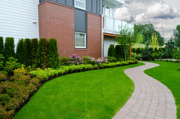 Modern apartment building with nice summer landscape in Vancouver, Canada, North America. Day time...