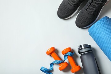 Sport equipment on white background, top view