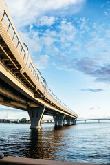 bridge over the water, an expressway against the sky. Transport architecture, engineering construction. western high-speed diameter expressway against the sky. High quality photo