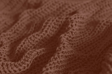 Mocha Mousse toned colour monochrome texture knitted fabric. Knitted Jersey as textile background....