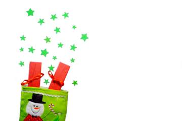 Christmas gift boxes with star decorations in a green snowman stocking isolated. Xmas celebration holiday winter theme concept. Copy space banner template for text and events. 