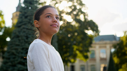 Multiethnic young little girl american indian latino student gen z teenager smiling happy...