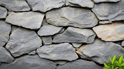 Obraz premium The black and white stone texture features a rocky surface close up that resembles an old, rough concrete wall