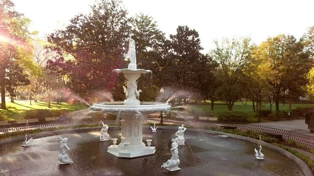 Slider shot of the famous fountain in Forsyth Park in Savannah, Georgia, USA at sunrise.