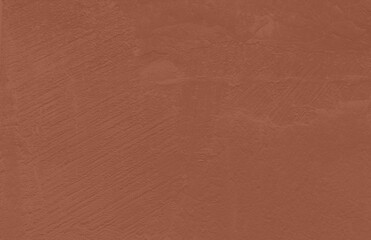 Fototapeta premium Mocha Mousse toned colour grunge decorative wall background. Art rough stylized texture banner trendy color 2025. Grunge brown color texture