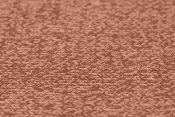 Mocha Mousse toned colour monochrome texture knitted fabric. Knitted Jersey as textile background....