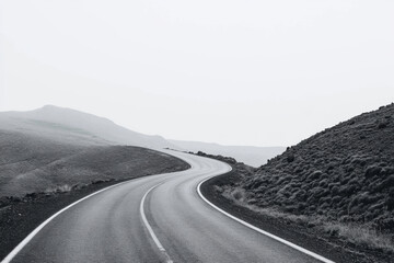 A serpentine road with sharp twists and turns, featuring a dashed centerline and smooth black pavement. Roadscape. AI generated.