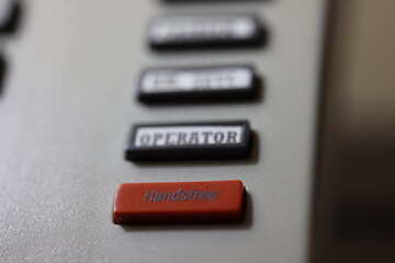 Phone Buttons in a Hotel, Handsfree red button