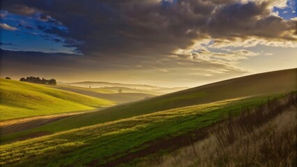 Obraz premium Rolling Green Hills Under Dramatic Cloudy Sky for Captivating Scenic Landscape Photography 