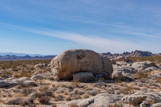 Weathering Porphyritic monzogranite (Cretaceous).  Granite Mountains，Mojave National Preserve South Entrance Kelbaker Road, San Bernardino County, California. Mojave Desert / Basin and Range Province.