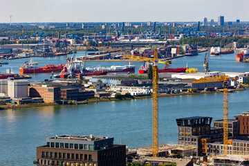 Aerial view of Port of Rotterdam, largest cargo seaport in Europe located in middle of...