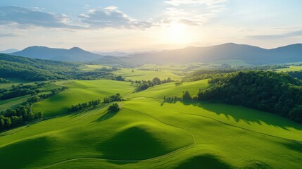 Obraz premium Breathtaking sunrise over rolling green hills nature landscape serene environment aerial view tranquility and beauty