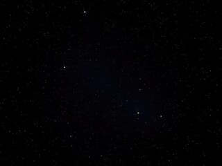 Fototapeta premium a mysterious winter night sky, white little stars on a black background