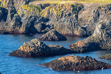 Arnastapi coastal landscape with cliffs in summer near the Snaefellsnes peninsula in Iceland