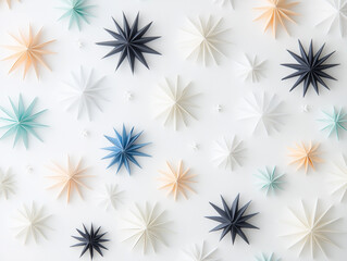 Beautiful pattern of a variety origami paper stars on a gray background with shadows. Holiday composition. Flat lay