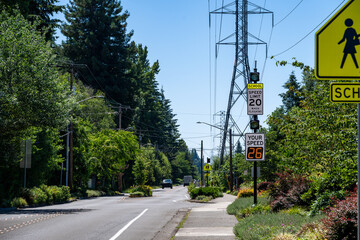Traffic safety in a residential and school zone, electronic sign that displays your speed, speeding...