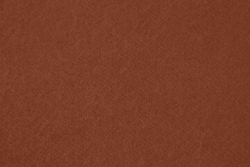 Mocha Mousse toned colour monochrome texture knitted fabric. Knitted Jersey as textile background. Monochrome color background. Wool knitting texture. Trendy color 2025.