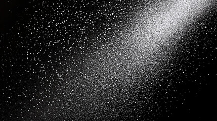 Obraz premium Intricate Microscopic World: High-resolution macro photograph showcasing delicate white powder particles suspended in a deep black void. The image reveals a mesmerizing interplay of light and shadow, 