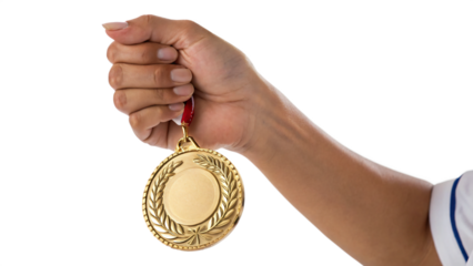 hand holding a gold medal