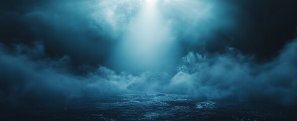 Obraz premium Dark moody blue scene with fog, light beam, and textured ground.