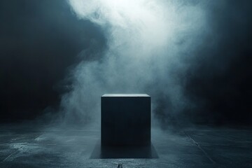 Dark, smoky room with a single, black cube on a concrete floor.