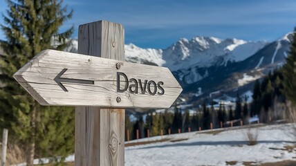 Wooden Directional Sign to Davos in the Swiss Alps