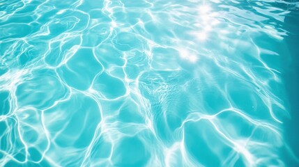 Obraz premium Beautiful view of swimming pool surface with clear blue water with sunlight reflections on wave. Summer vacation concept background