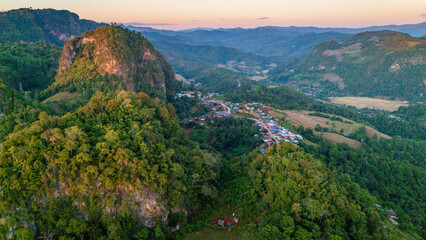 Fototapeta premium aerial view at sunset of Ban Jabo a Black Lahu village in Mae Hong Son Thailand near Pai 