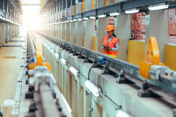the worker is depicted amidst the organized chaos of a bustling warehouse, engaged in tasks such as inventory management, order fulfillment, or logistical operations.
