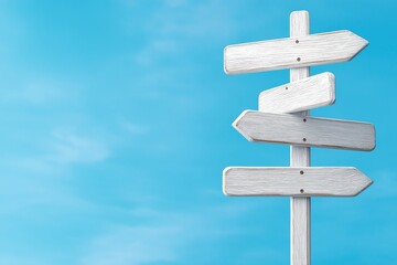 Wooden signpost with multiple blank directional arrows against a clear blue sky, symbolizing choices and direction in travel and exploration.