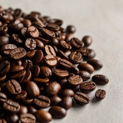 Obraz premium pile of dark coffee beans on white surface 