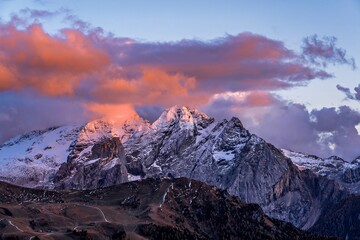 Panoramic view of snow-capped mountains in the Dolomites in Italy.